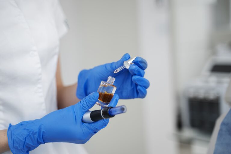 What is PRP therapy - doctor or nurse holding syringe and platelet-rich plasma vial for joint and soft tissue healing treatment