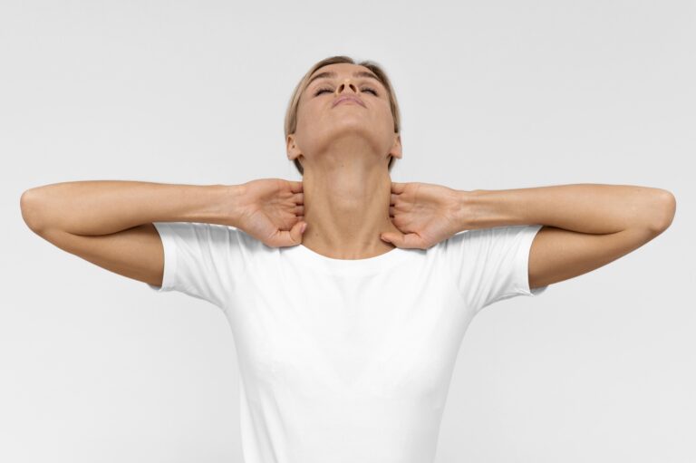 front view woman doing one of the best neck pain stretches at home for relief