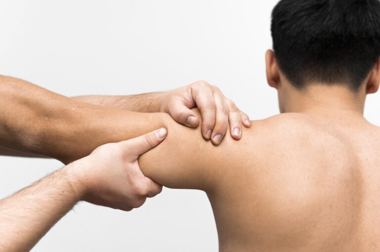 male patient getting Non-Surgical Shoulder Pain Treatments